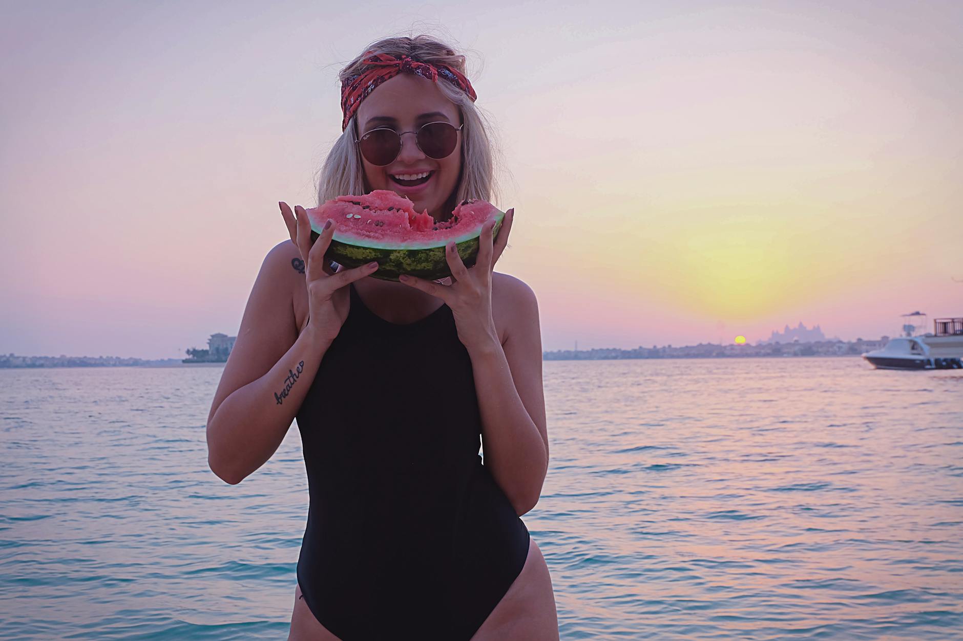 Photo by The Lazy Artist Gallery | via Pexels | License: Pexels License | https://www.pexels.com/photo/woman-holding-slice-of-watermelon-1406511/