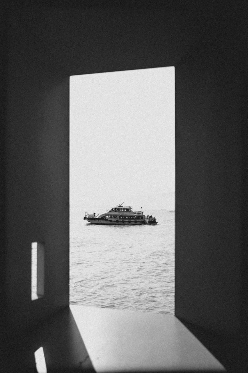Photo by lange x | via Pexels | License: Pexels License | https://www.pexels.com/photo/serene-view-of-a-boat-on-the-sea-from-window-33342180/