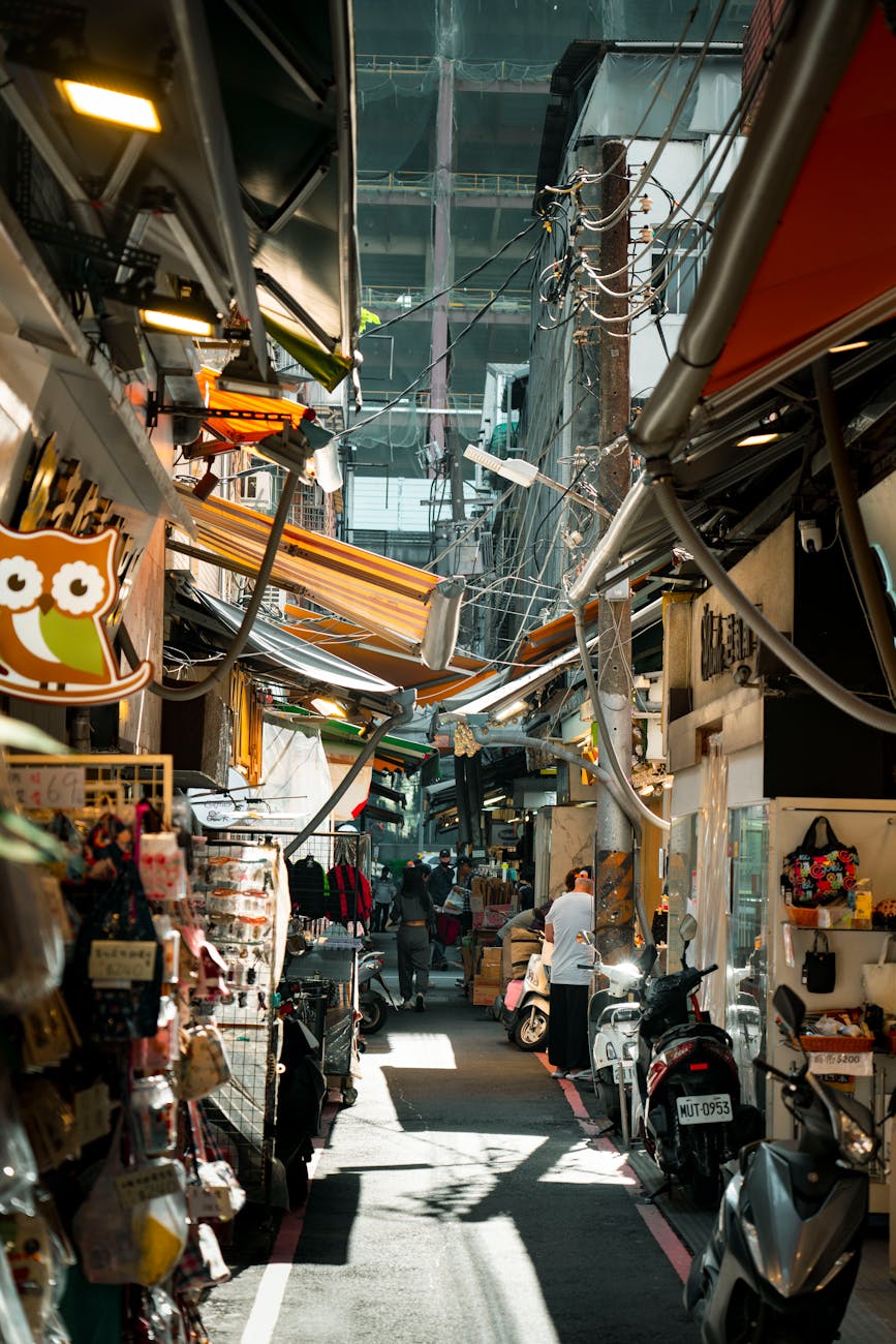 Photo by Jimmy Liao | via Pexels | License: Pexels License | https://www.pexels.com/photo/bustling-alleyway-market-in-taipei-city-34749808/