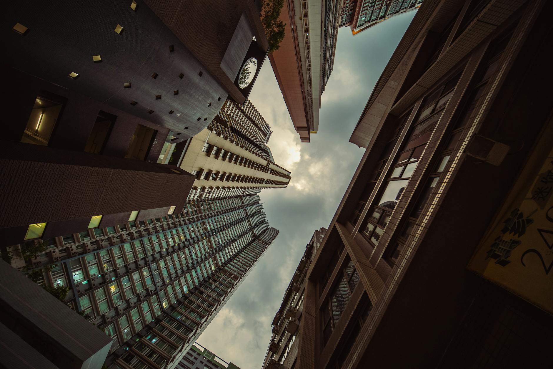 Photo by Jimmy Chan | via Pexels | License: Pexels License | https://www.pexels.com/photo/low-angle-shot-of-modern-skyscrapers-17755151/