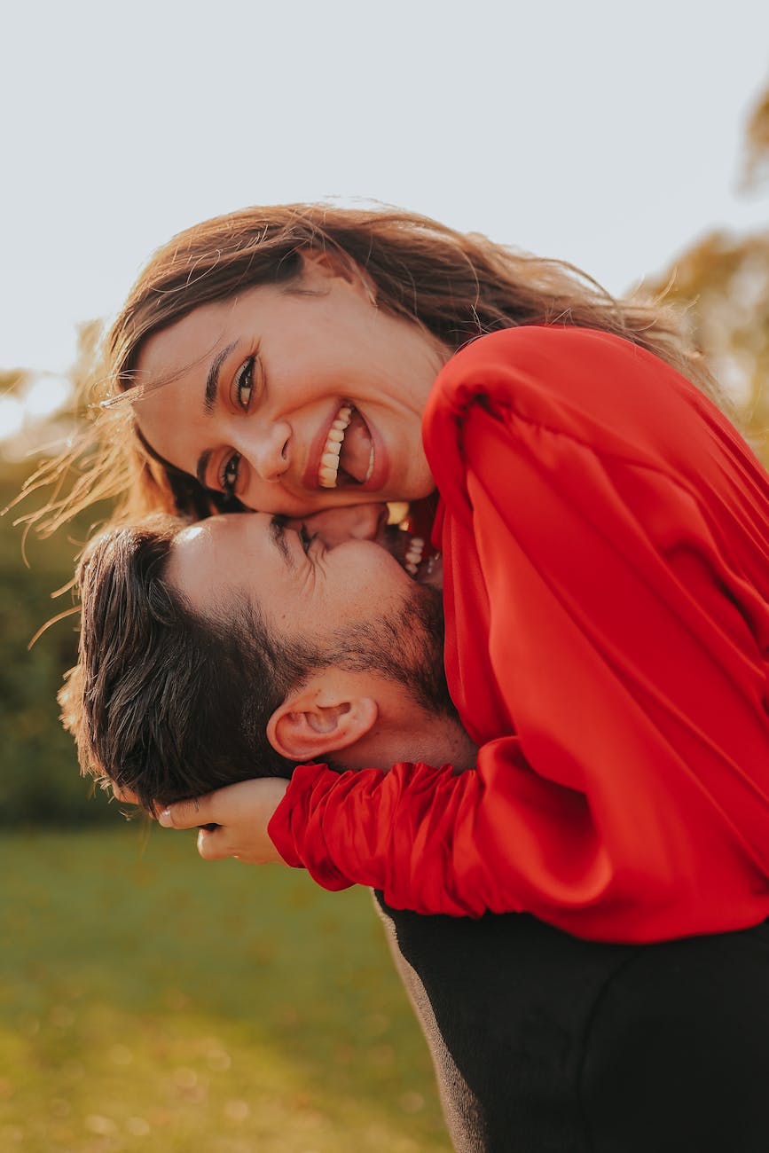 Photo by Oğuz Uğur | via Pexels | License: Pexels License | https://www.pexels.com/photo/man-in-black-shirt-holding-woman-in-red-sweater-20214267/