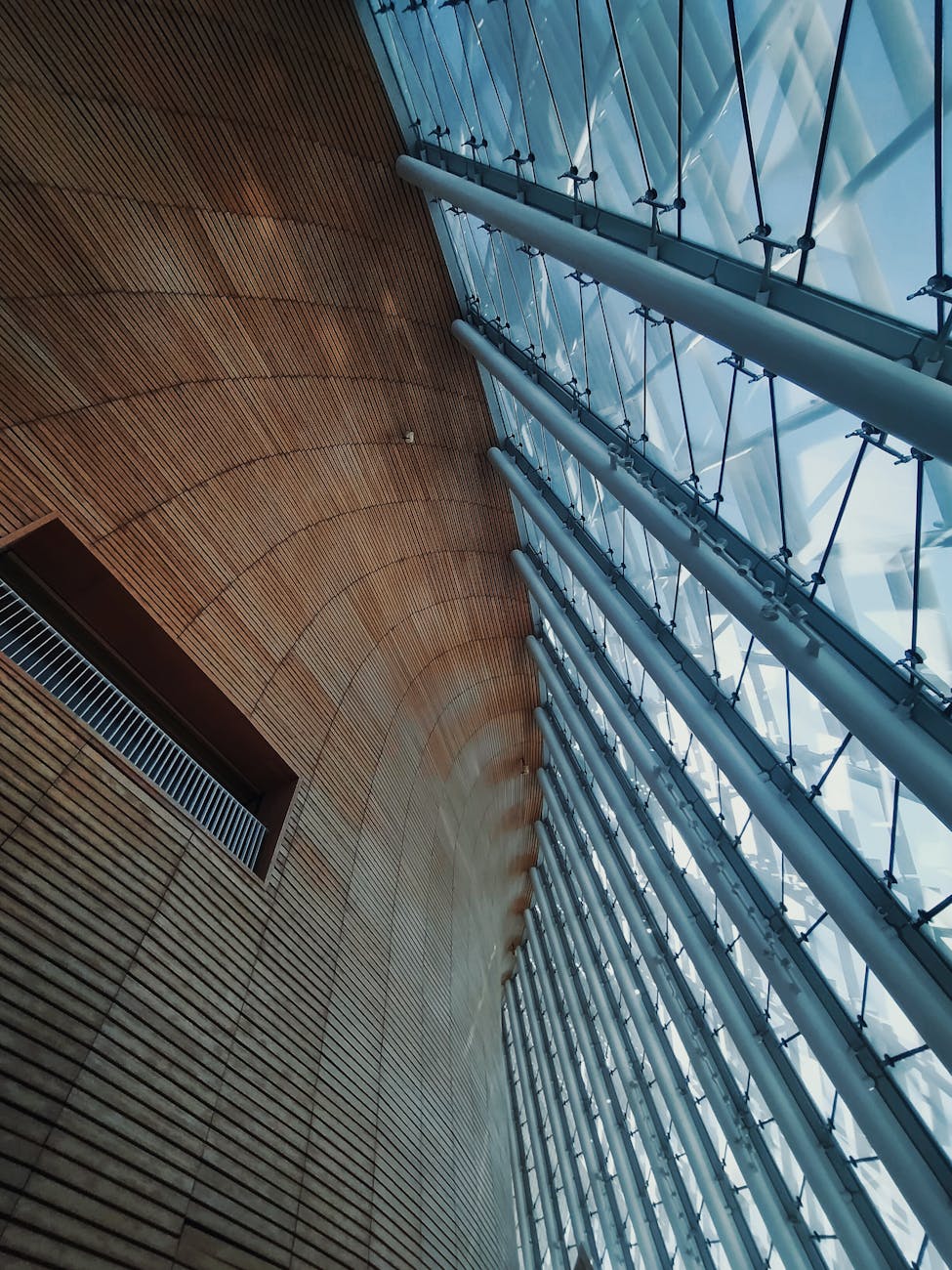 Photo by liv Finn | via Pexels | License: Pexels License | https://www.pexels.com/photo/modern-architectural-interior-with-glass-walls-33650828/