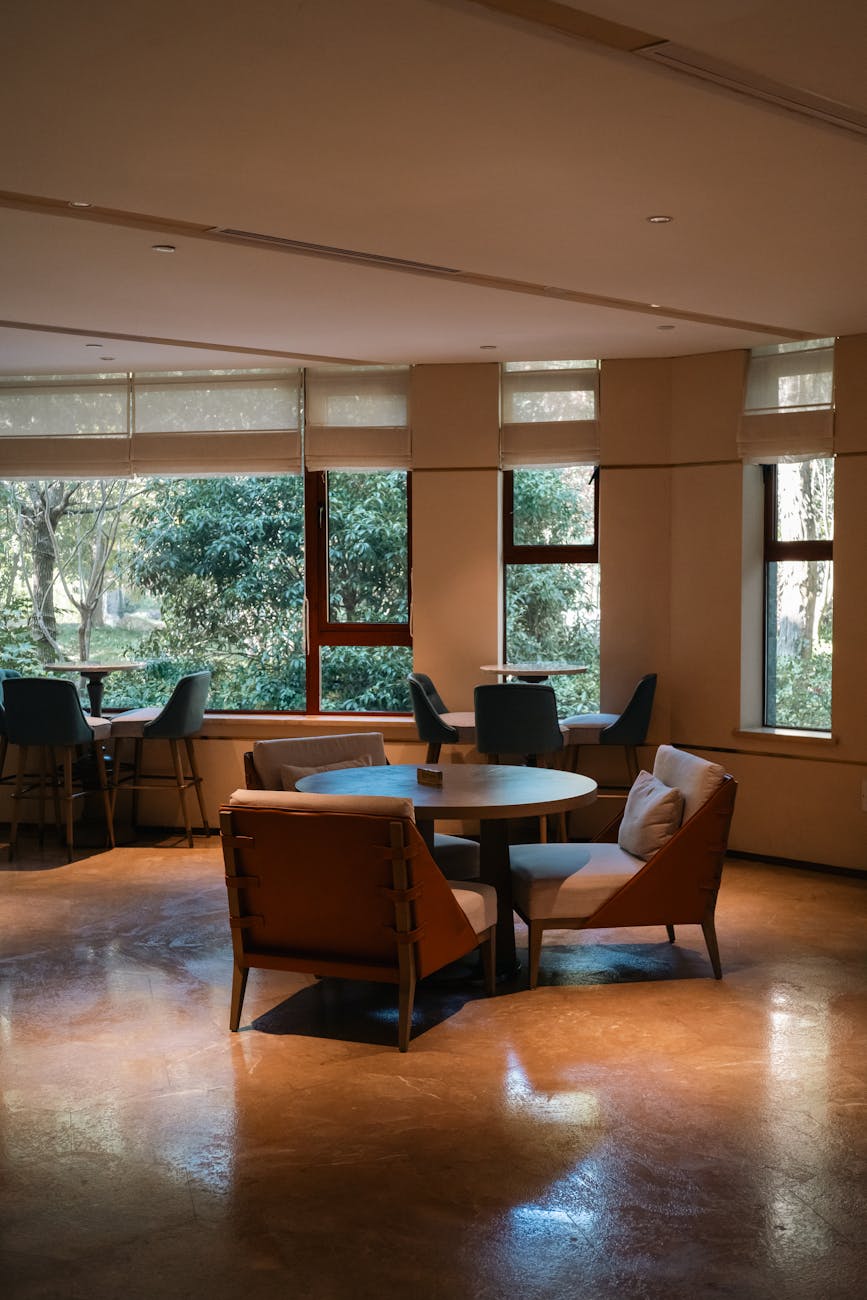 Photo by Cheng Shi Song | via Pexels | License: Pexels License | https://www.pexels.com/photo/cozy-lounge-area-by-large-windows-in-hotel-35022069/