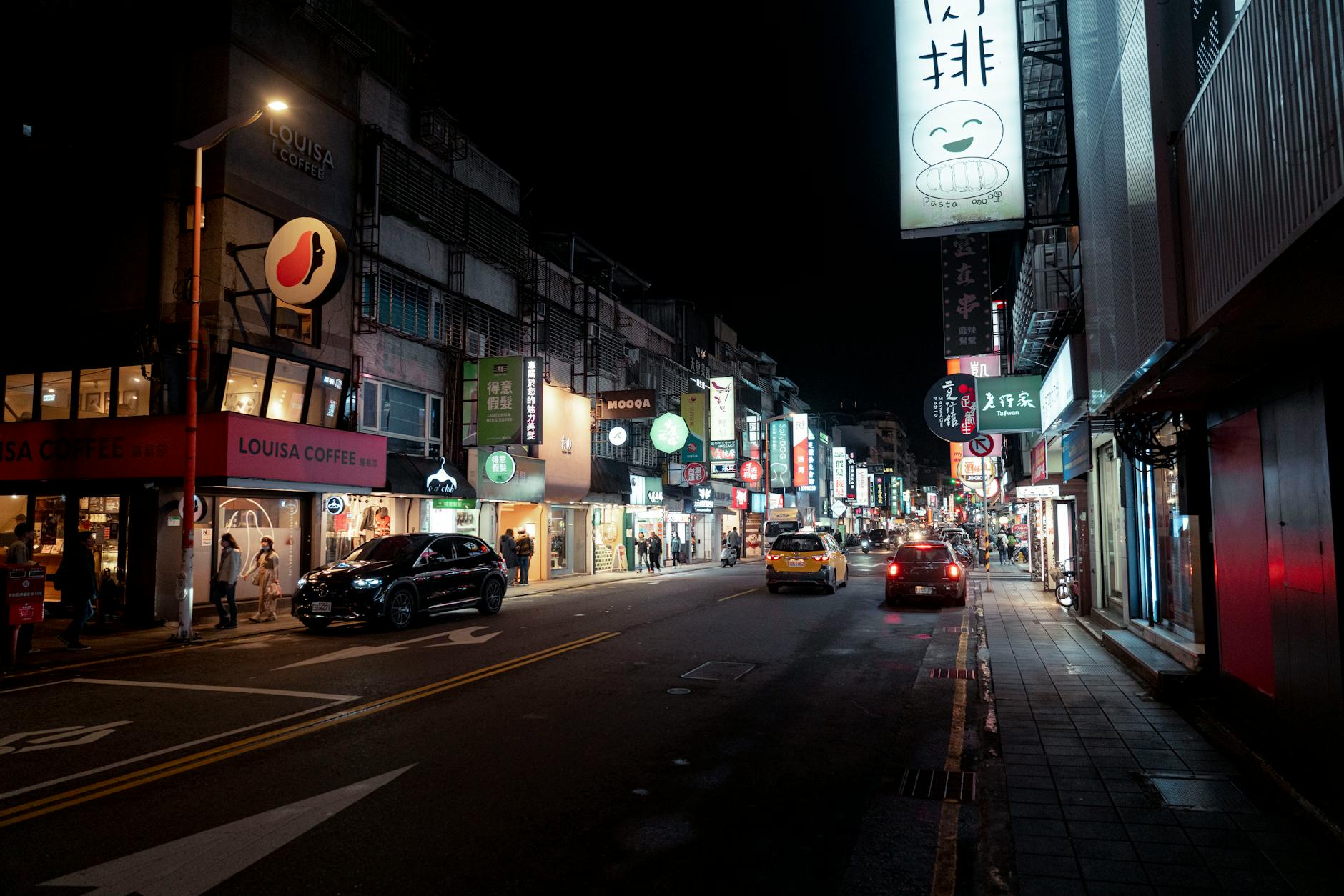 Photo by Jimmy Liao | via Pexels | License: Pexels License | https://www.pexels.com/photo/vibrant-night-street-scene-in-taipei-taiwan-35398734/