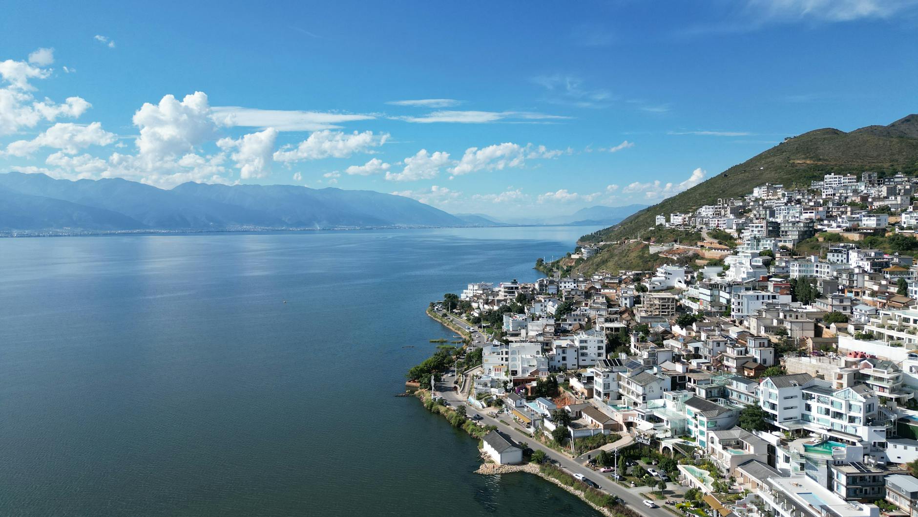Photo by chet ong | via Pexels | License: Pexels License | https://www.pexels.com/photo/aerial-view-of-dali-city-and-erhai-lake-yunnan-35410604/