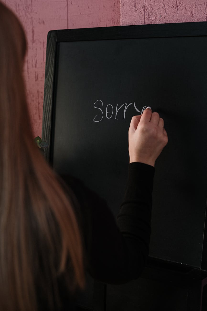 Photo by cottonbro studio | via Pexels | License: Pexels License | https://www.pexels.com/photo/woman-in-black-long-sleeve-shirt-writing-on-the-chalkboard-3825291/