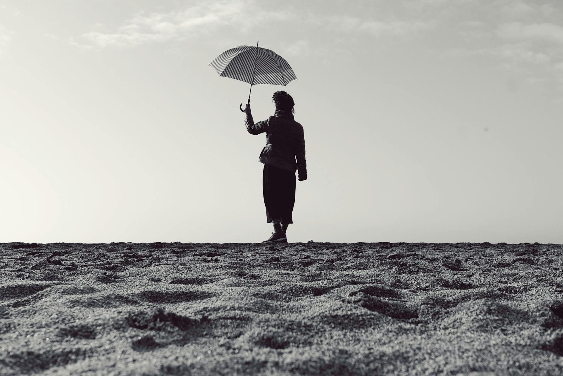 Photo by Ai Tanaka | via Pexels | License: Pexels License | https://www.pexels.com/photo/a-woman-holding-an-umbrella-7133949/