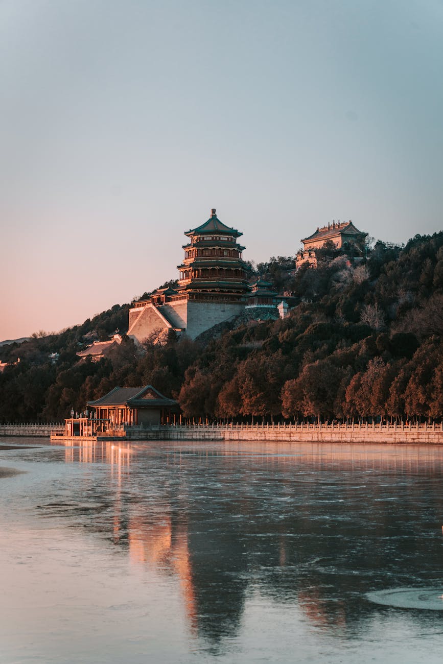 Photo by zhang kaiyv | via Pexels | License: Pexels License | https://www.pexels.com/photo/foxiang-ge-tower-on-hill-above-lake-shore-in-beijing-china-16143144/