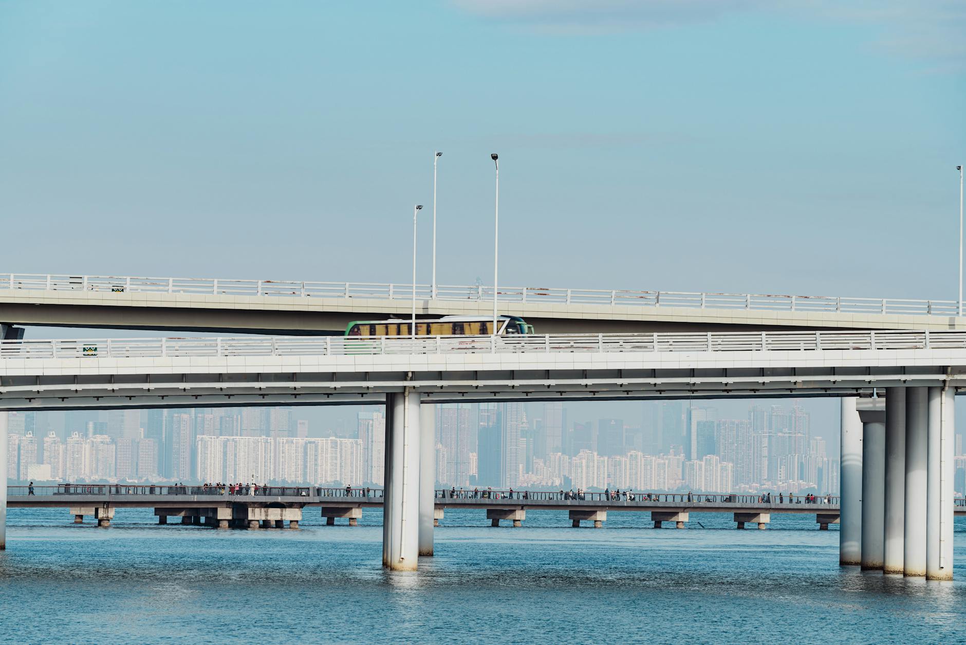 Photo by Orange Ocean | via Pexels | License: Pexels License | https://www.pexels.com/photo/modern-bridge-with-skyline-in-background-30119261/
