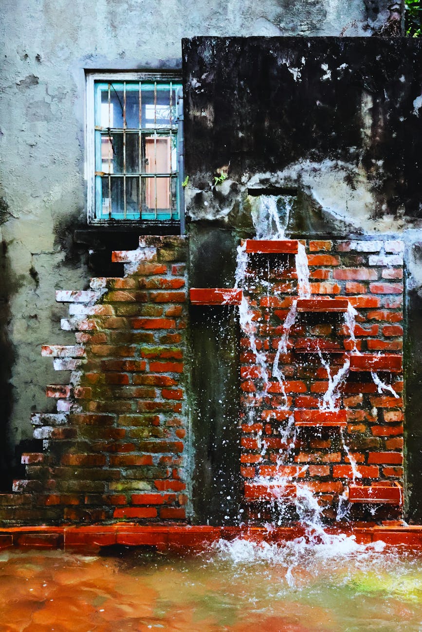Photo by Sunny Li | via Pexels | License: Pexels License | https://www.pexels.com/photo/rustic-brick-wall-with-water-feature-in-taiwan-33472074/