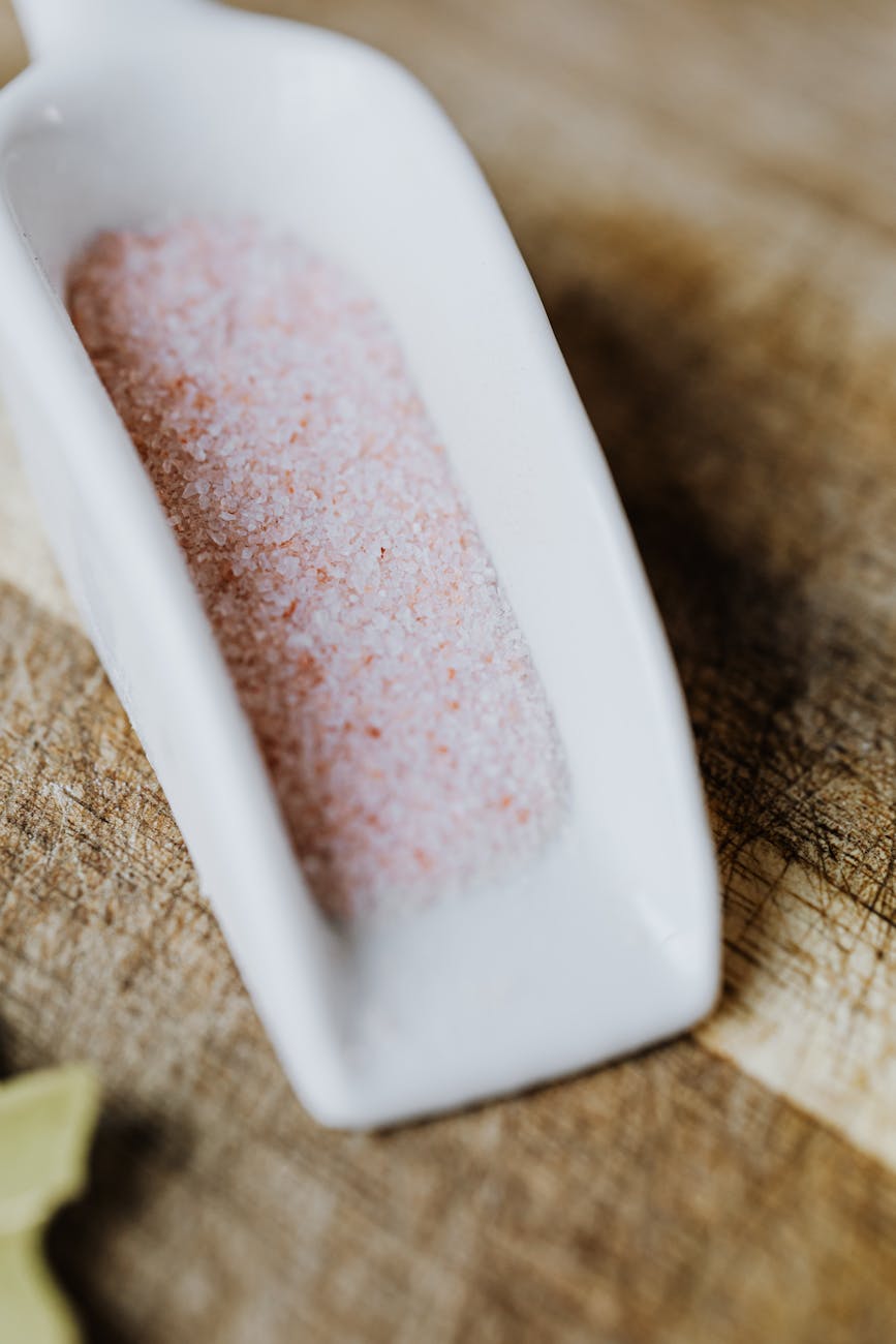 Photo by Karola G | via Pexels | License: Pexels License | https://www.pexels.com/photo/a-close-up-shot-of-himalayan-salt-on-a-ceramic-scooper-4871093/