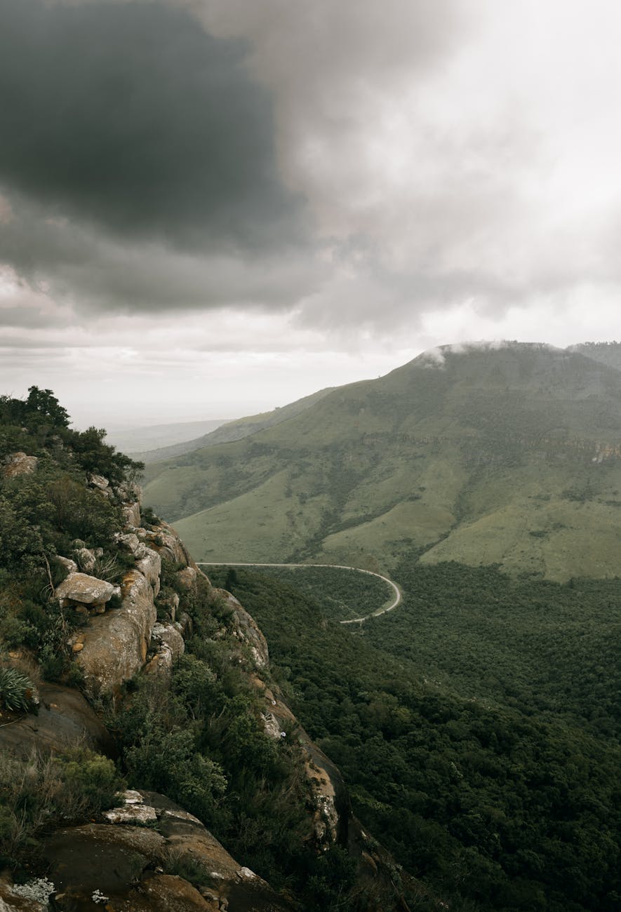 Photo by Taryn Elliott | via Pexels | License: Pexels License | https://www.pexels.com/photo/a-green-mountains-under-the-cloudy-sky-6552208/